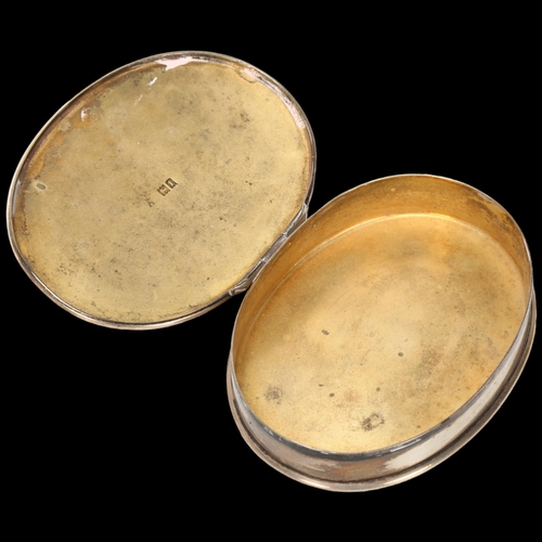 1581 - An Edwardian silver tobacco box, no maker, London 1906, plain oval form, 9cm, 2.7oz