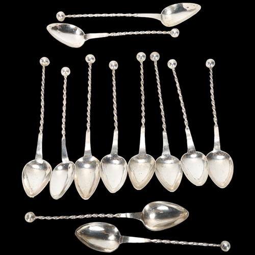 1583 - A set of 12 Continental silver teaspoons, with spiral handles, 12.5cm, 2.2oz