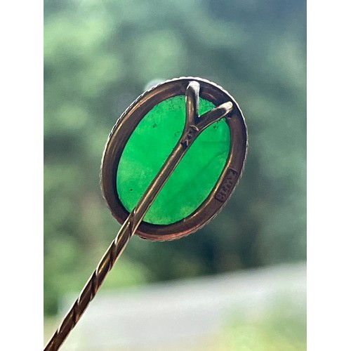 1117 - A Chinese 18ct gold jadeite jade stickpin, maker's marks ZW, set with oval cabochon jade of 3.5ct, j... 