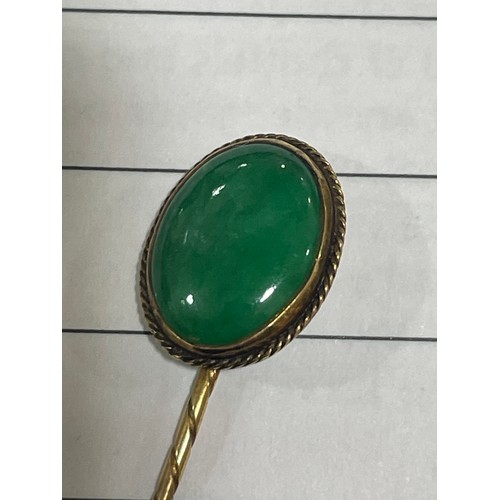 1117 - A Chinese 18ct gold jadeite jade stickpin, maker's marks ZW, set with oval cabochon jade of 3.5ct, j... 