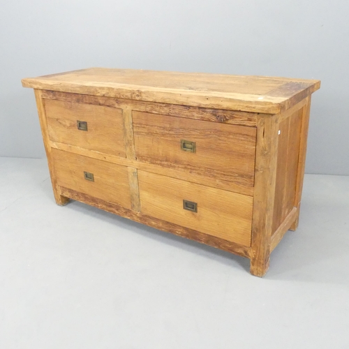 2663 - A modern pine side table, with four frieze drawers with campaign style brass handles. 123x67x46cm.