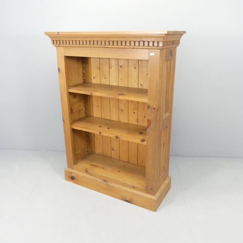 2691 - A modern pine open bookcase with two adjustable shelves. 92x122x35cm.