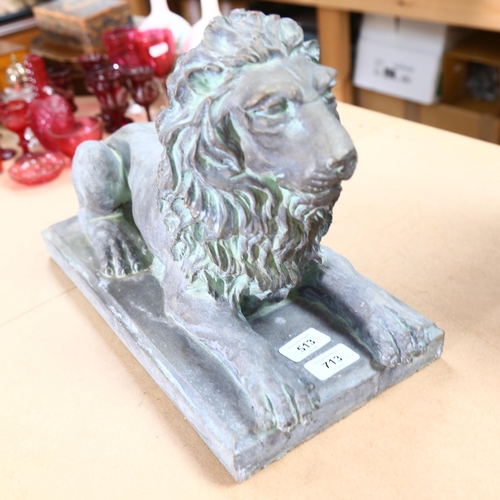 896 - A terracotta lion sculpture on plinth, with verdigris finish, L39cm overall