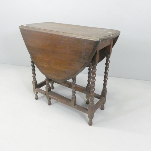 2716 - Ana antique oak oval gate-leg drop-leaf table with barley twist legs. 78x72x34cm (extending to 106cm... 