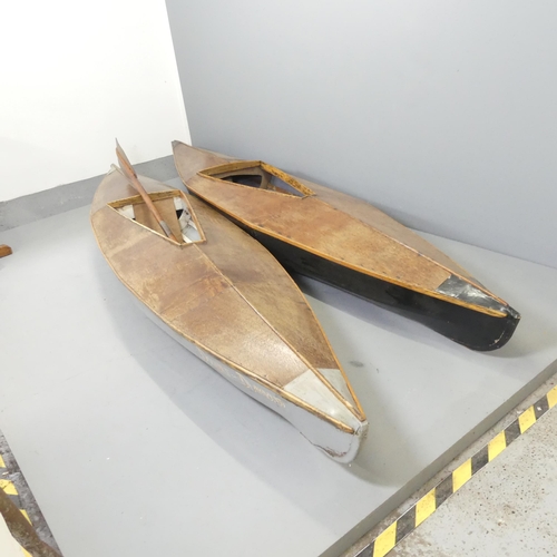 2594 - A pair of 1960s canvas on wooden framed kayak with teak decks. Length 335cm.