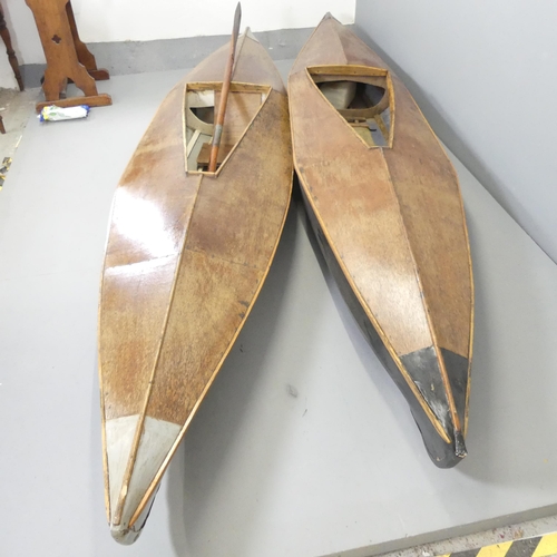 2594 - A pair of 1960s canvas on wooden framed kayak with teak decks. Length 335cm.