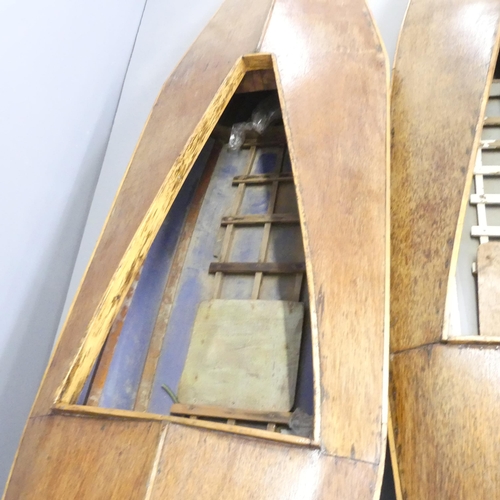 2594 - A pair of 1960s canvas on wooden framed kayak with teak decks. Length 335cm.