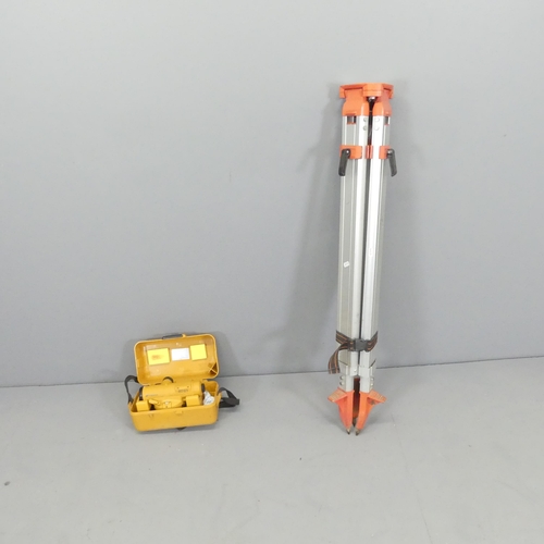 2597 - A Topcon AT-G7 surveyor's leveller, with case and tripod stand.