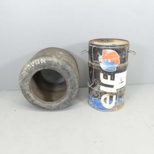 2600 - Motor Racing interest - an Avon Formula 3000 slick tyre, Diameter 54cm, and an Elf oil barrel, 37x62... 