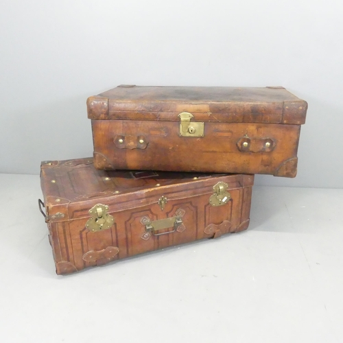 2612 - Two antique leather trunks. Largest 95x37x58cm.