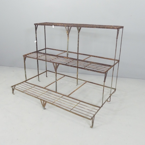 2616 - An antique wirework three-tier plant stand. 98x75x60cm.