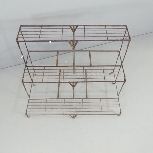 2616 - An antique wirework three-tier plant stand. 98x75x60cm.