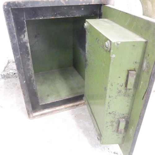 2627 - An antique painted metal floor safe, by Samuel Withers and co, West Bromwich. 42x51x41cm. With key. ... 