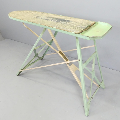 2629 - A mid-century ironing board, with paper label for Fab-Ware, by PTP ltd. 120x79x47cm.