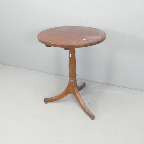 2656 - A 19th century mahogany circular tilt-top occasional table, on turned central column with tripod bas... 