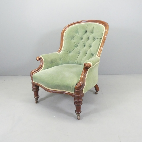 2659 - A Victorian mahogany and walnut button-back upholstered armchair.