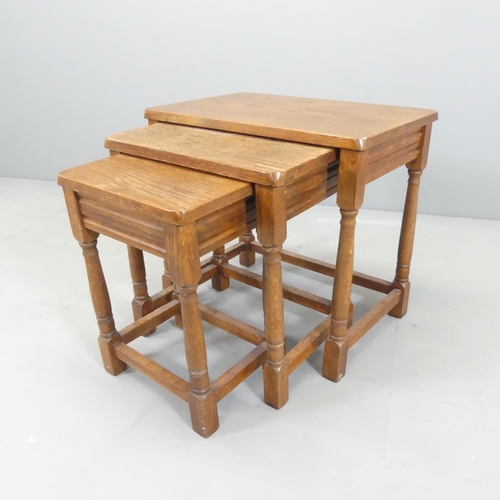 2667 - An oak nest of three occasional tables. Largest 51x48x34cm.