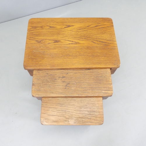 2667 - An oak nest of three occasional tables. Largest 51x48x34cm.