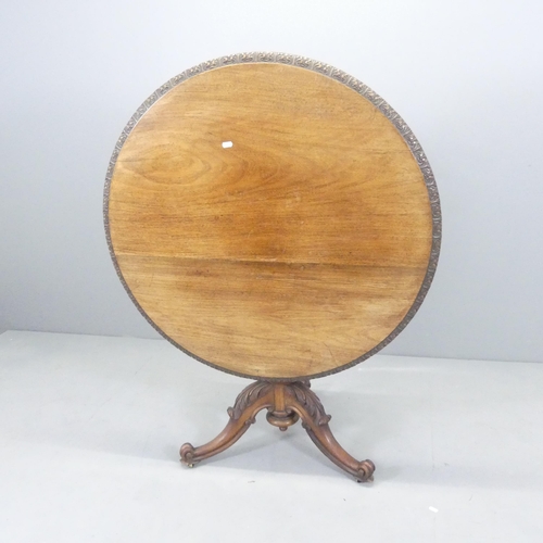 2683 - A 19th century Art Nouveau mahogany circular tilt-top occasional table, with carved decoration, cent... 