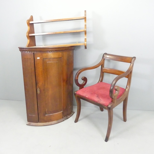 2687 - A Georgian mahogany corner cupboard, 70x97x47cm. a Regency desk chair and a three-tier hanging shelf... 