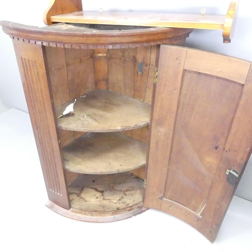 2687 - A Georgian mahogany corner cupboard, 70x97x47cm. a Regency desk chair and a three-tier hanging shelf... 