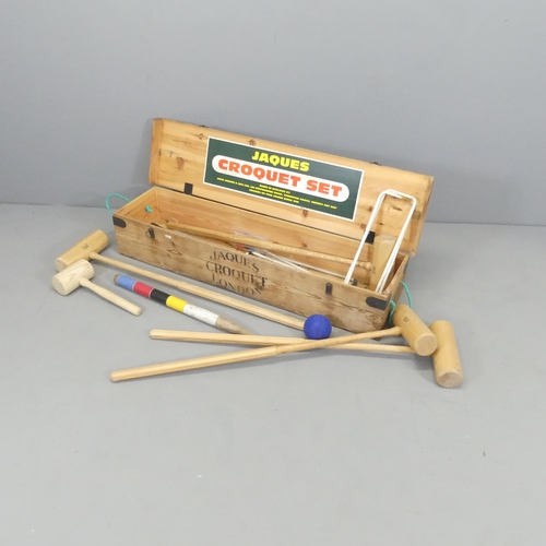 2697 - A Jaques four person croquet set in pine case. Case dimensions 110x20x27cm.