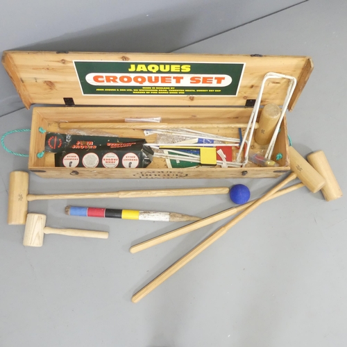 2697 - A Jaques four person croquet set in pine case. Case dimensions 110x20x27cm.