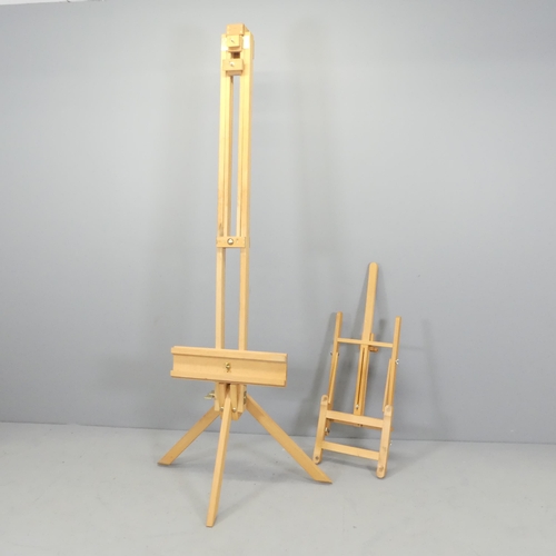 2702 - A Windsor and Newton folding artists easel, and a Daler and Rowney tabletop folding easel (2).