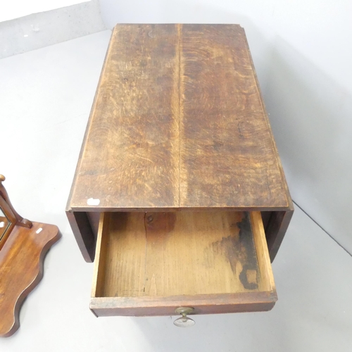 2706 - An early 20th century oak drop-leaf Pembroke table with end frieze drawer, 83x72x47cm, and a swing t... 