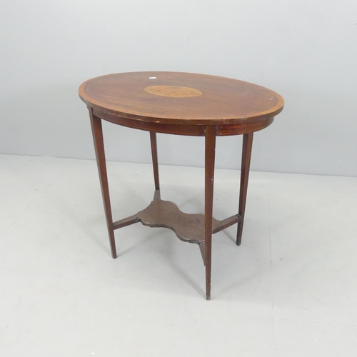 2708 - A Victorian mahogany and satinwood strung two-tier oval topped occasional table, with inlaid shell d... 