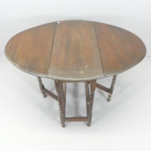 2716 - Ana antique oak oval gate-leg drop-leaf table with barley twist legs. 78x72x34cm (extending to 106cm... 