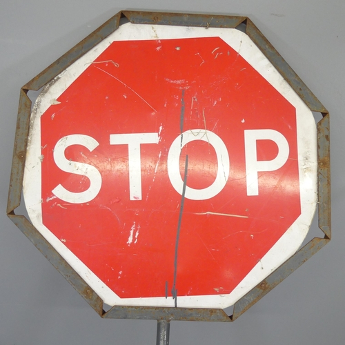 2721 - A metal framed Stop/Go road sign, Diameter 64cm, Height overall 210cm