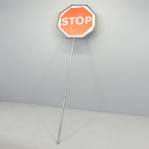 2721 - A metal framed Stop/Go road sign, Diameter 64cm, Height overall 210cm