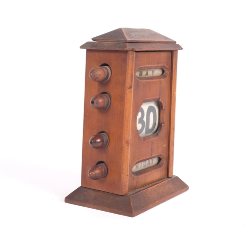 504 - An early 20th century stained wood desk calendar, comprising day date and month, H15cm
