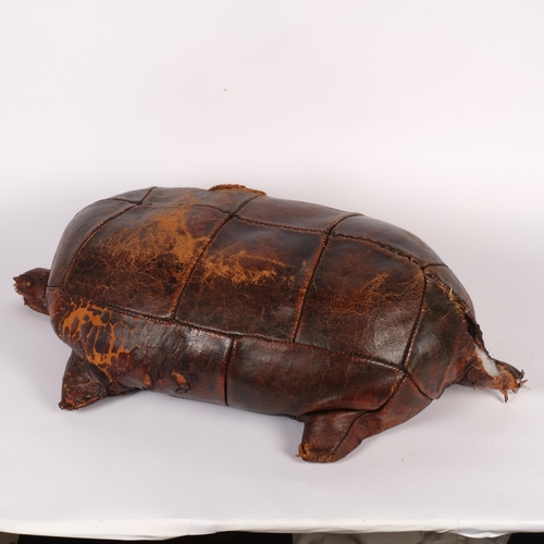 526 - OMERSA - a 20th century wood shaving filled and leather-covered study of a turtle footstool, probabl... 