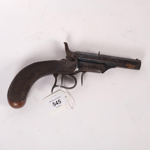 545 - A 19th century rim fire target pistol, with octagonal steel barrel, barrel unmarked, carved walnut b... 