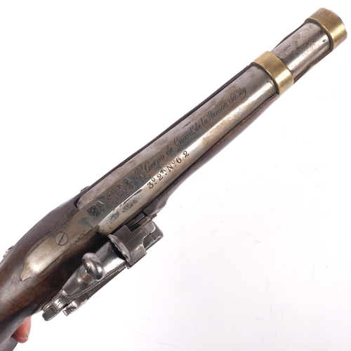555 - A reproduction flintlock pistol, steel barrel, brass bands, turned walnut stock, L35cm
