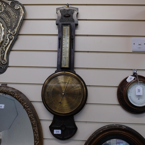 619 - An Art Nouveau oak-framed aneroid barometer with thermometer, by Kendal & Dent, L77cm