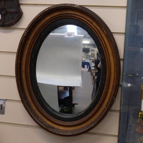 621 - 19th century giltwood oval framed wall mirror, H52cm