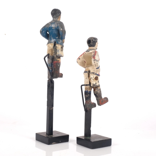 640 - 2 Vintage painted lead footballing figures, with hinged leg, mounted on stands, tallest 19cm