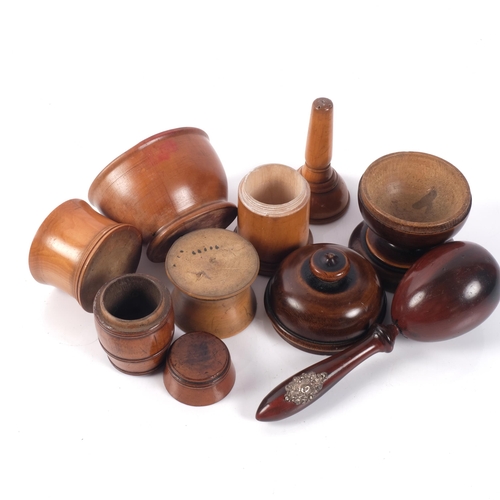 647 - A group of Antique treen items, including a string box, a silver-mounted pestle, a wig powderer etc ... 