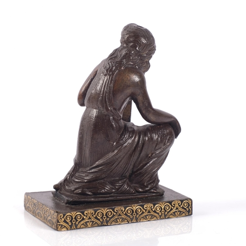 654 - A small patinated bronze study of a kneeling figure, H10cm