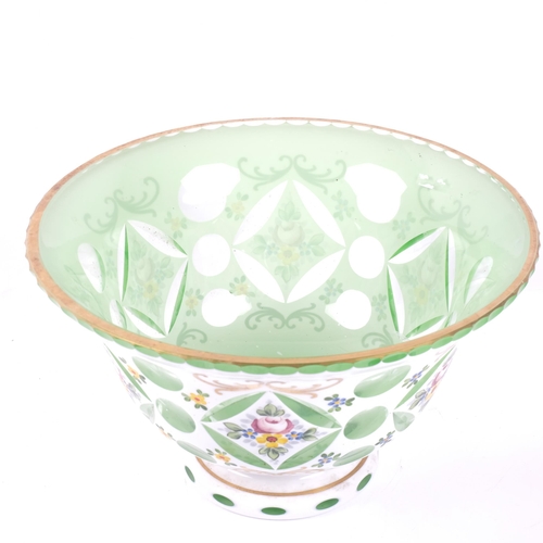 662 - A Bohemian green and white enamel glass table centre bowl, with floral and gilded decoration, diamet... 