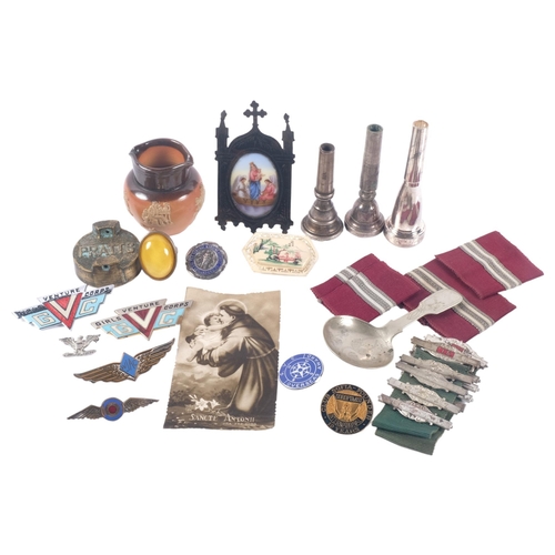 682 - A group of various items, including a miniature Doulton jug, a silver nurse's badge, Pratt's bronze ... 