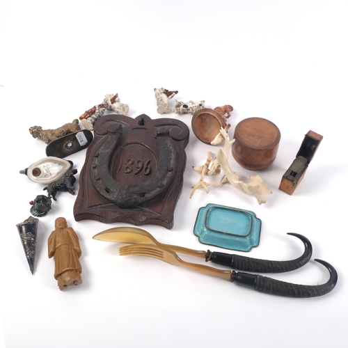 686 - A tray of interesting items, including a pair of antler mounted salad servers, a ceramic cat music g... 