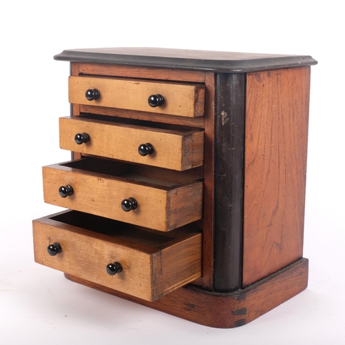 704 - A Victorian mahogany table-top chest of 4 short drawers, H28cm