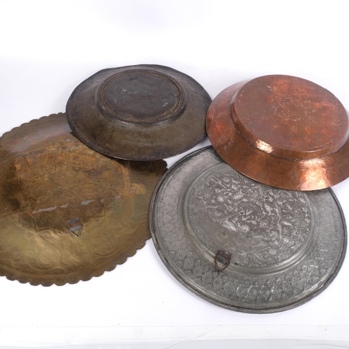 713 - A group of 4 Islamic trays, including Cairo Ware, and copper etc, widest 34cm