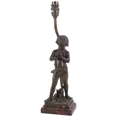 881 - A bronze figure of a boy playing the flute, signed Jean Louis Gregoire, converted to a table lamp, h... 