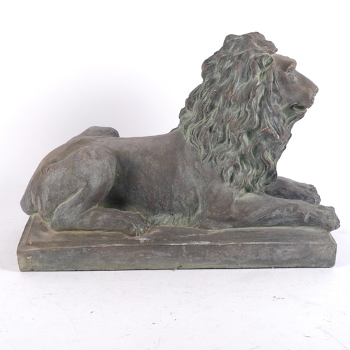 896 - A terracotta lion sculpture on plinth, with verdigris finish, L39cm overall