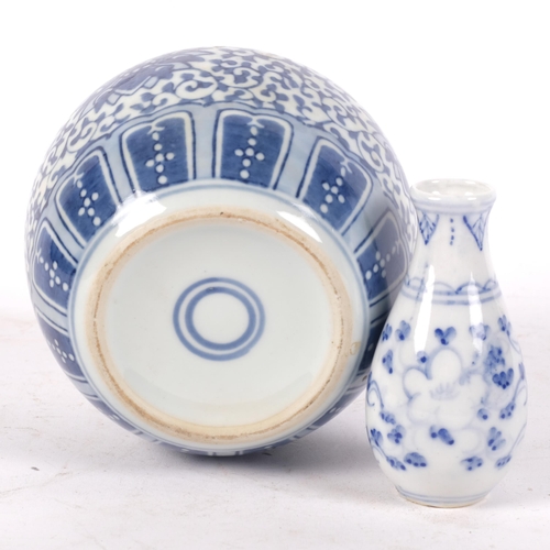 918 - An Oriental porcelain vase with floral decoration, 9.5cm, and a ginger jar